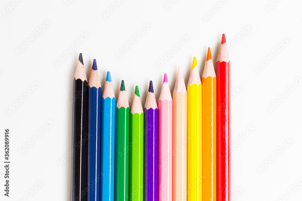 Isolated colored pencil on white background. Top view 