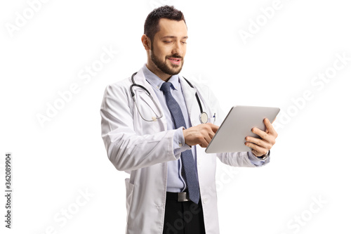 Male doctor using a digital tablet