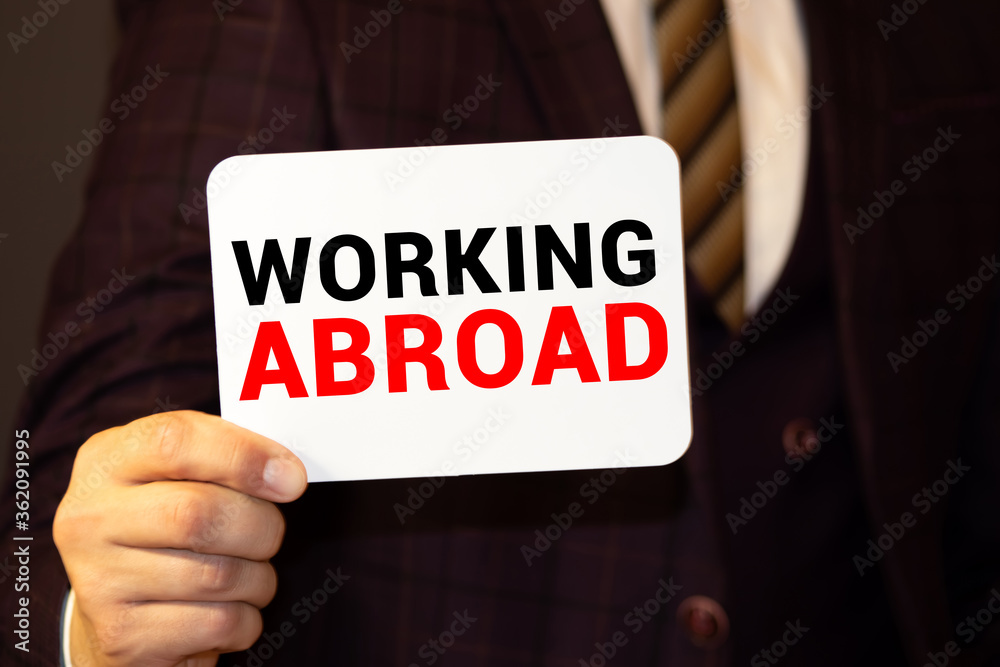 Work Abroad card with bokeh background Work Abroad card with bokeh background