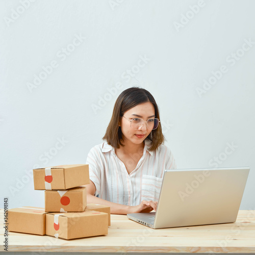 Women selling products online at home.