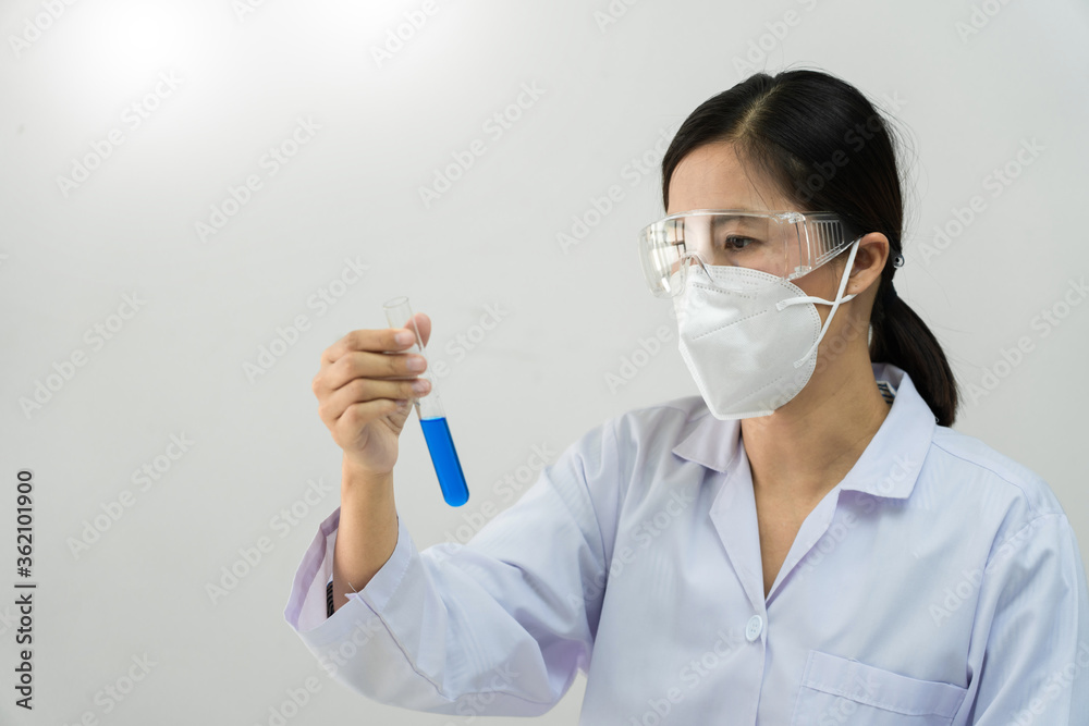 Asian scientist doing research for analyzing a Experiments sample in laboratory.
