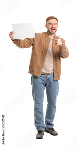 Young man with blank card s...