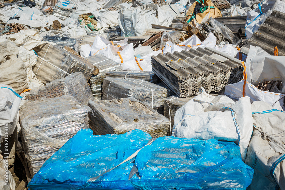 Asbestos landfill . Roof covering material with asbestos fiber