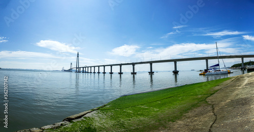 The gigantic grand bridge and beautiful skyline panorama.