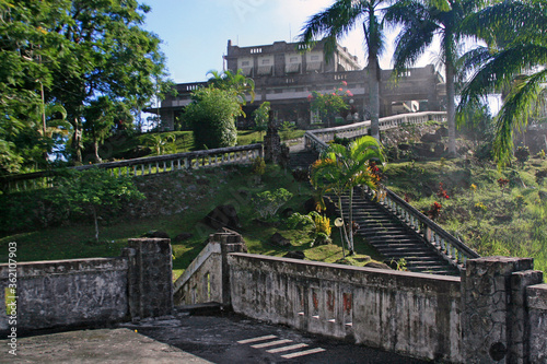 An old building with stairs going up in one of the islands of Bangka Belitung Indonesia, morning atmosphere when the sun is shining