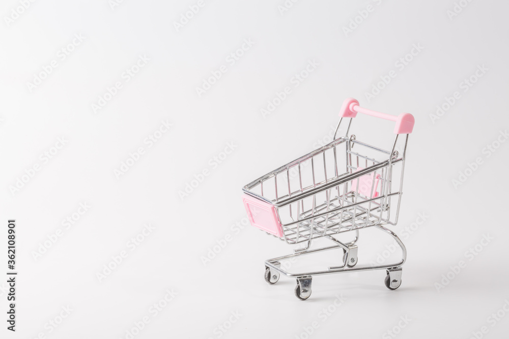 Shopping cart over white background Shopping cart over white background