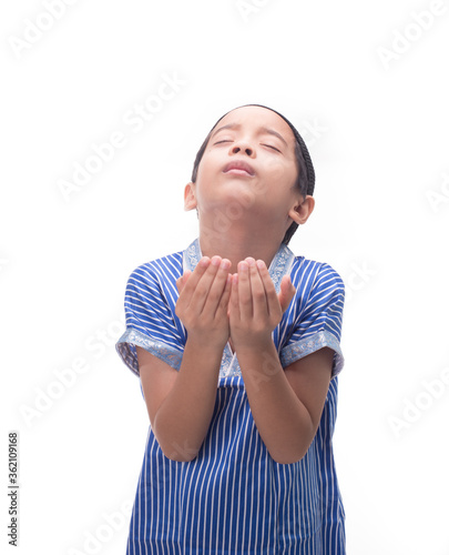 A Muslim kid with various poses isolated over white