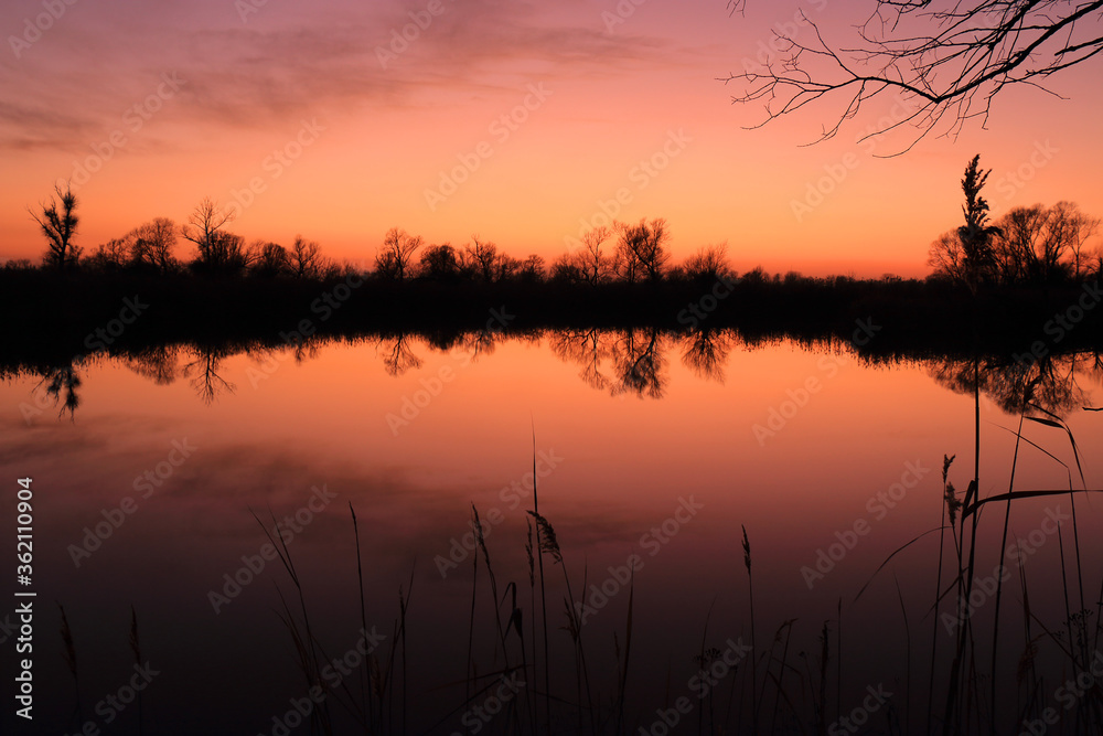 Colorful sunset by the Odra River, Poland.