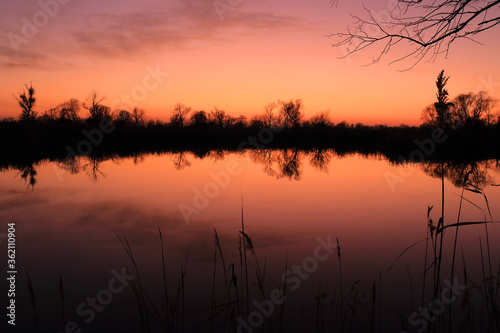 Colorful sunset by the Odra River  Poland.