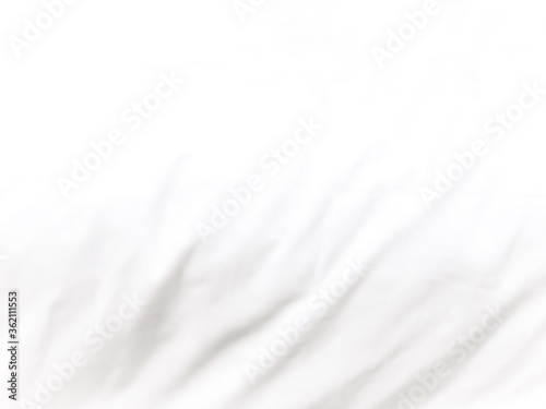 Closeup of out of focus white satin fabric background  wavy surface of bed linen topview image.