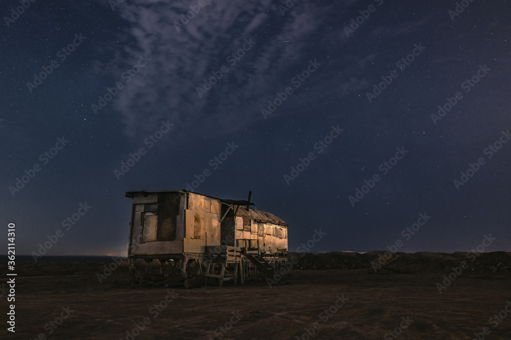 Old fishing hut in the night