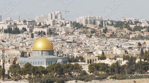 View On Jerusalem Old city and the Temple Mount, Dome of the Rock and Al Aqsa Mosque from the Mount of Olives in Jerusalem, Israel - Pan Left