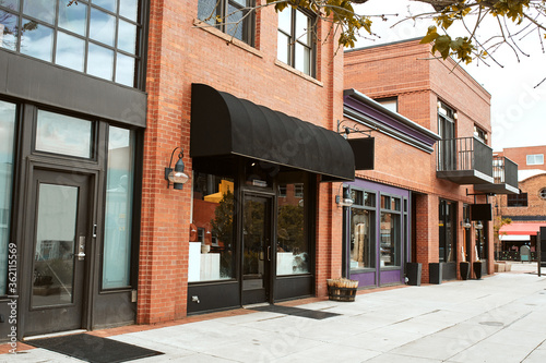 Shops, retail business and restaurants along Pearl Street Mall, a pedestrian mall in Boulder County. Boulder, Colorado, USA