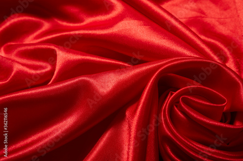 Luxury red satin smooth fabric background for celebration, ceremony, event invitation card or advertising poster