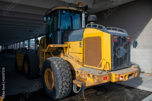 Snow Mover Wheel Loader Machine Parked in Parkade