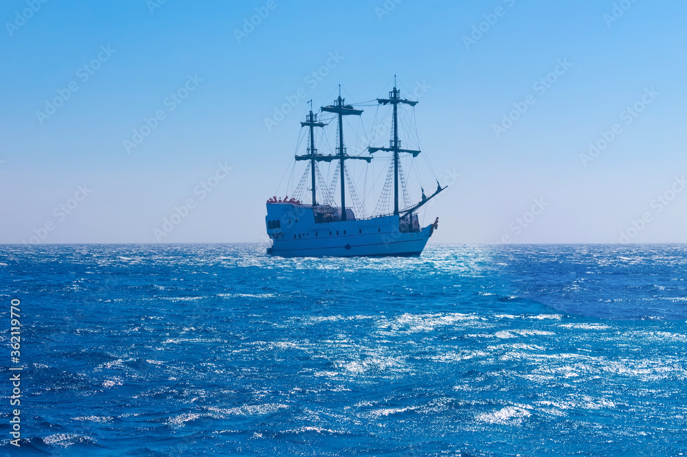 Seascape with sailing ship on sunset. Seascape with sailing ship on sunset.