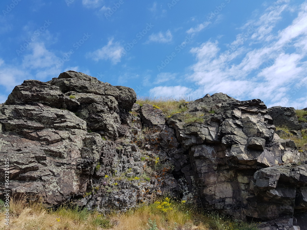 Stone rocks against the blue sky