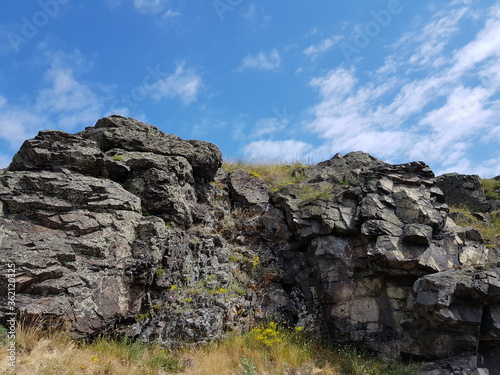 Stone rocks against the blue sky © kos1976