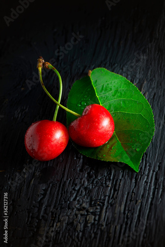 cherry on a wooden background red food