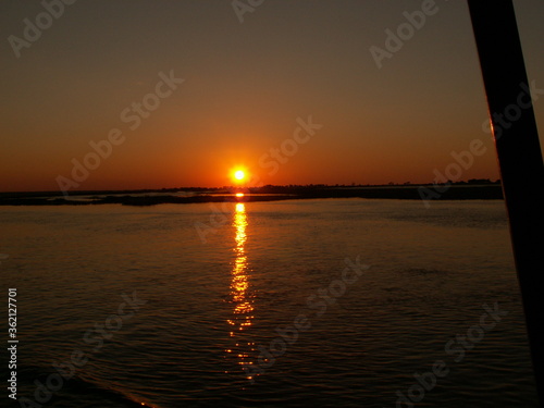 Sunset over water Chobe National Park, Botswana