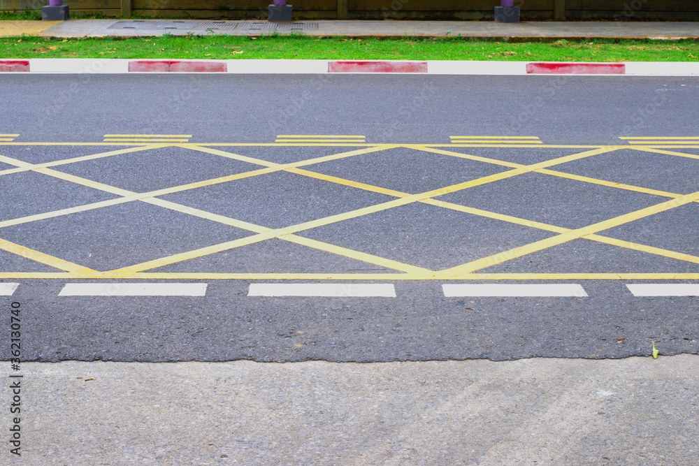 Fototapeta premium No Parking Yellow Cross Zone Sign On The Road
