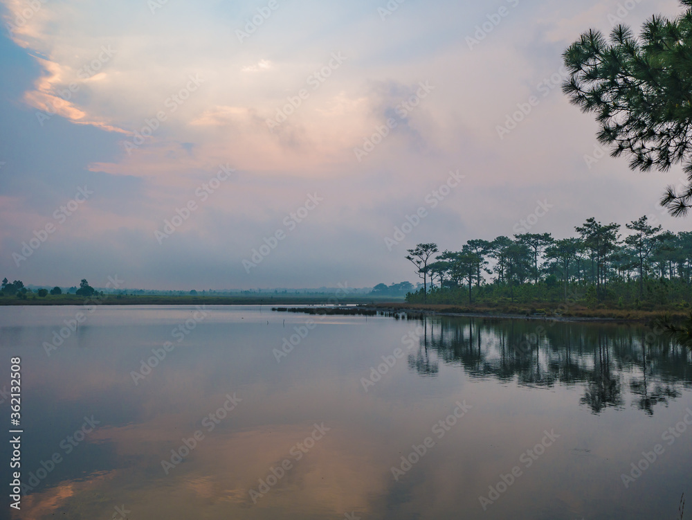 Sunrise Scenery view at reservoir on Phu Kradueng mountain national park in Loei City Thailand.Phu Kradueng mountain national park the famous Travel destination Sunrise Scenery view at reservoir on Phu Kradueng mountain national park in Loei City Thailand.Phu Kradueng mountain national park the famous Travel destination