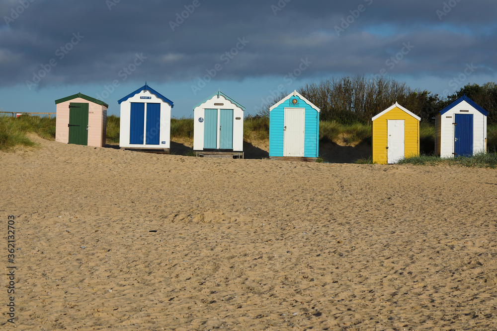 colorful beach huts at the seaside in Southwold colorful beach huts at the seaside in Southwold