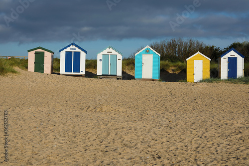 colorful beach huts at the seaside in Southwold © Anna