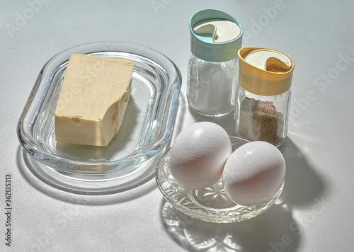 Few ingredients for preparing simple fried eggs