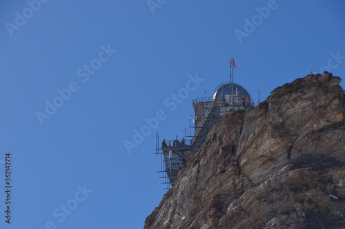 The Sphinx Observatory sits perched on a rocky outcropping, high in the Swiss Alps near the Jungfrau and the Jungfrau Glacier in Switzerland.