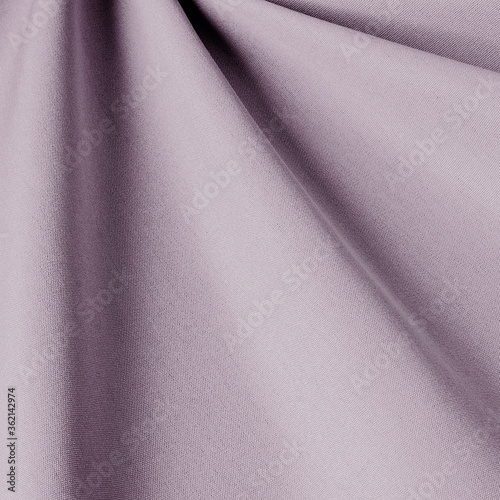 Plain fabric light lilac background. Fabric with natural texture, Cloth backdrop.