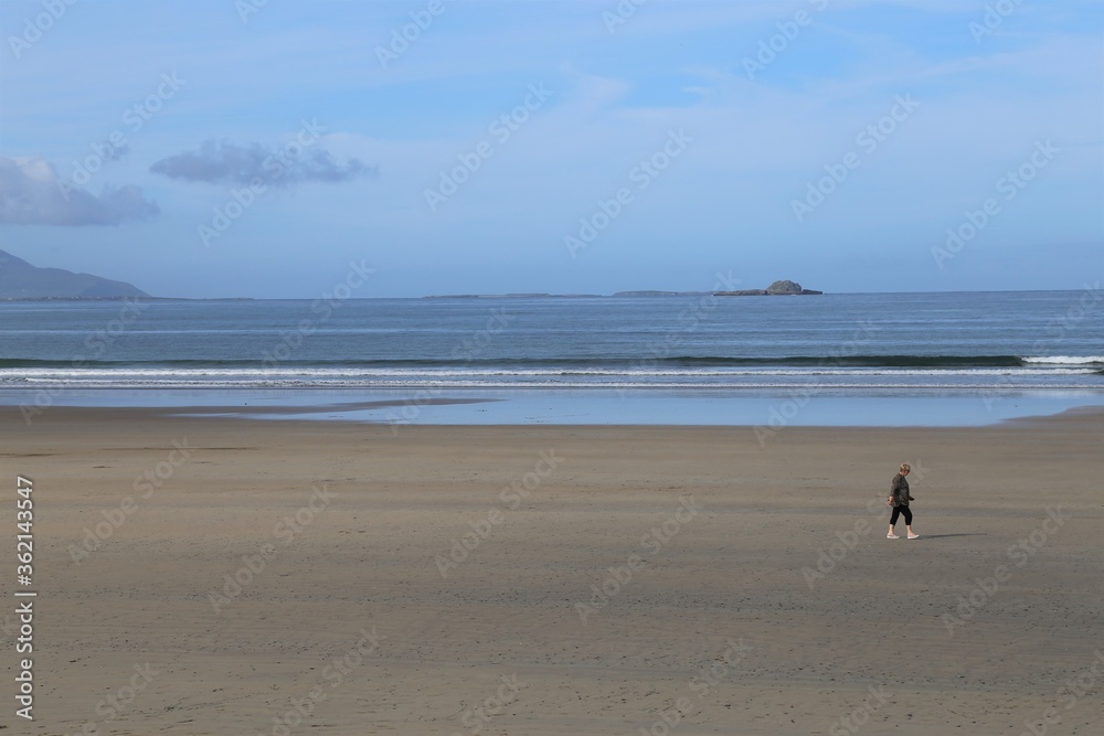 The near deserted Banna beach, County Kerry, with the Dingle Peninsula, in the background, Ireland.