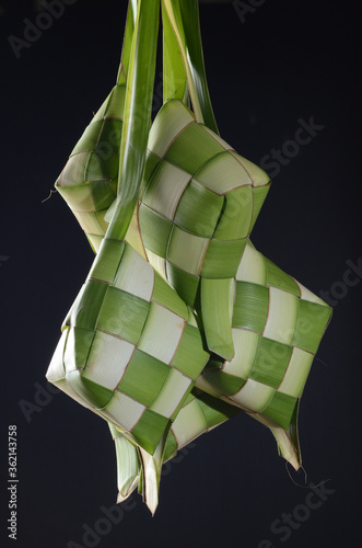 Ketupat, it is a traditional rice cake often seen during the Eid Holiday or other Indonesian Islam Holiday. photo