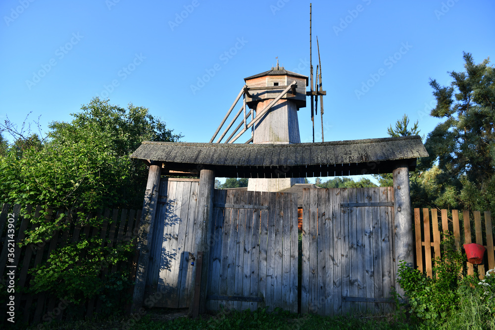 old wooden barn in a meadow at sunrise old wooden barn in a meadow at sunrise