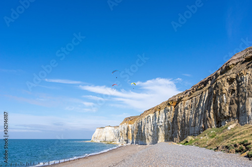 Paragliding over the beach at Newhaven UK photo