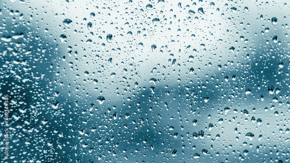 Raindrops on the glass, cloudy day with rain Raindrops on the glass, cloudy day with rain