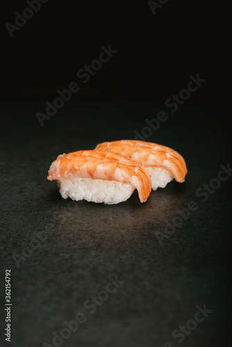 Japanese prawn nigiri sushi photo bank on black background