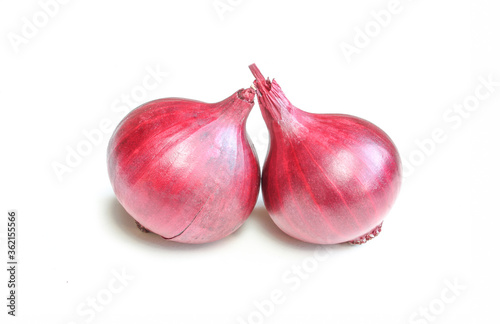 Red organic onion bulbs isolated on white background.