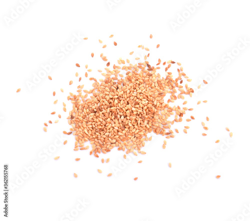 sesame seeds on the wooden background. Two type of sesame seeds in wooden spoon.