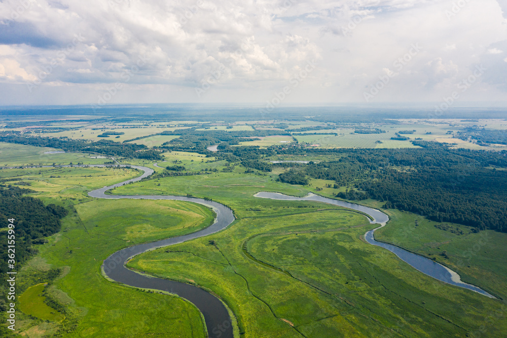 Aerial view of the river in the valley, summertime