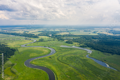 Aerial view of the river in the valley, summertime