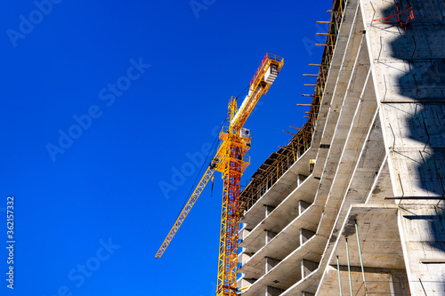 BATUMI, GEORGIA- March 9, 2020: a big crane in Construction building project in Batumi.Georgia photo
