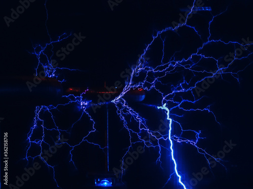 Loose electrical discharge with many branches similar to lightning in the dark