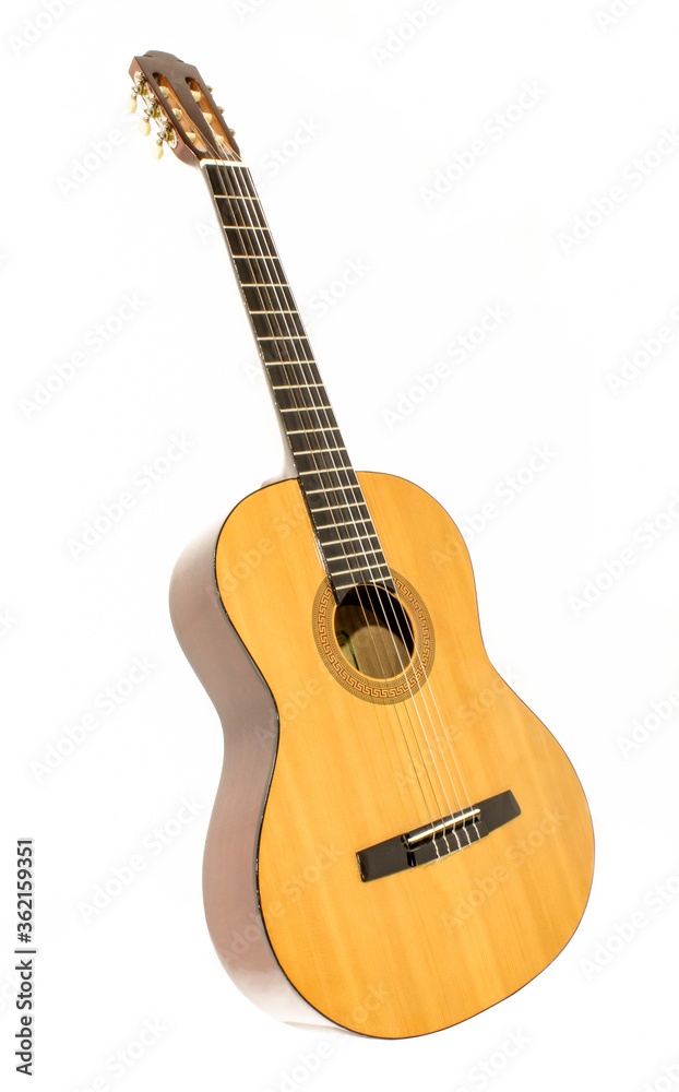 Acoustic guitar isolated on white background. Musical instrument close-up