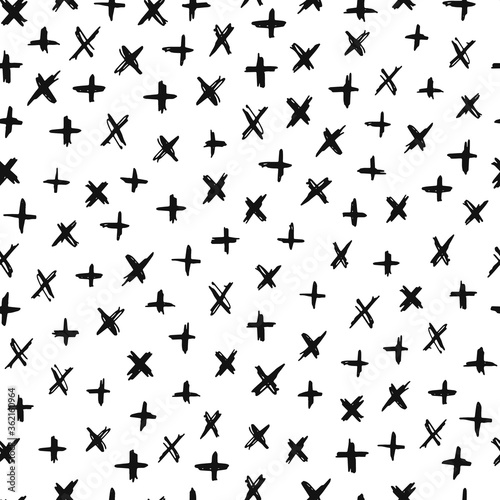 seamless pattern created from hand drawn crosses on white background. Good for textile and fabric prints, wrapping paper, scrapbooking, stationery, etc. 