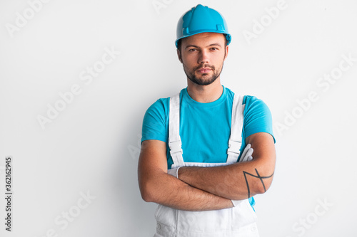 Confident contractor with crossed arms