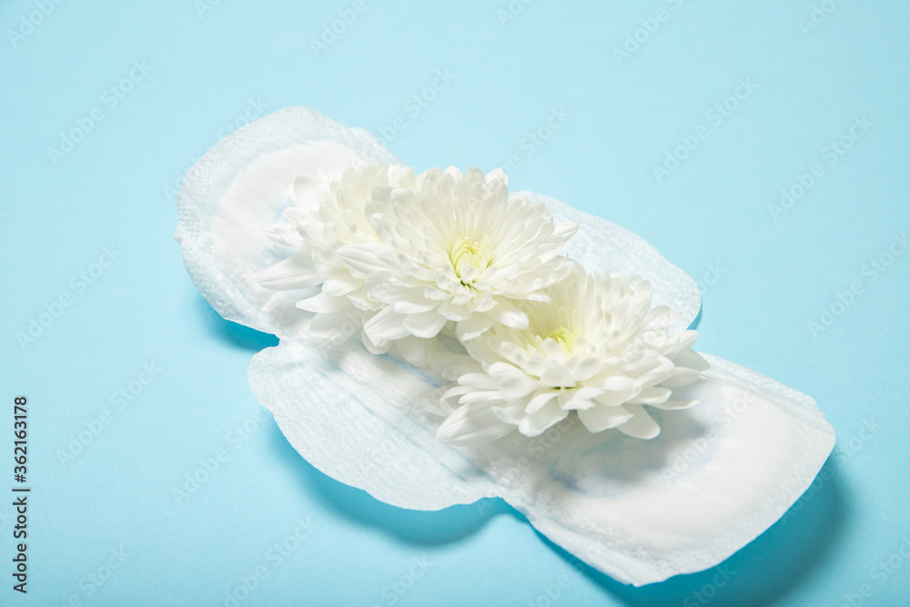 Feminine pads on a blue background. Menstruation. Gynecology. Women Health