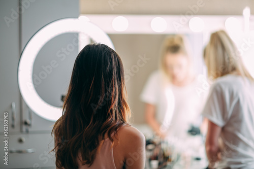 Makeup woman artist at work, professional in action, beauty salon and creative classes