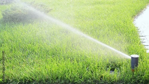 head of garden, yard, lawn, grass automatic irrigation watering system, close up full HD stock video footage in real-time