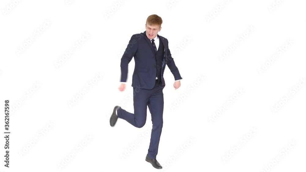 Enthusiastic, excited man, winner, dancing against a white background in the studio, laughing, celebrating job achievement, professional victory, happy, contented, business man enjoying a victory Enthusiastic, excited man, winner, dancing against a white background in the studio, laughing, celebrating job achievement, professional victory, happy, contented, business man enjoying a victory